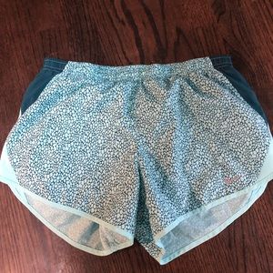 - Nike running shorts. Aqua and teal. Size Small